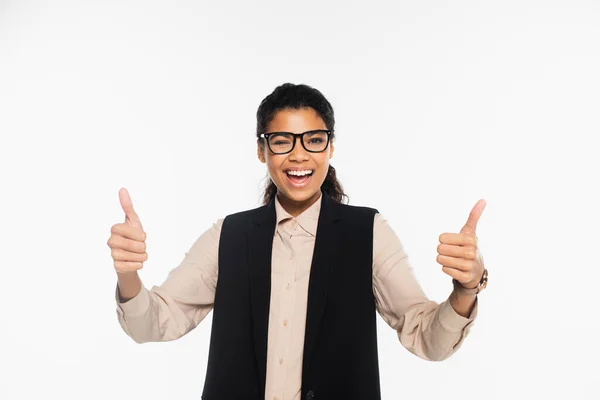 Happy african american businesswoman winking and showing like isolated on white — Stock Photo