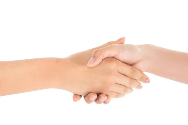 Cropped view of young women shaking hands isolated on white — Stockfoto