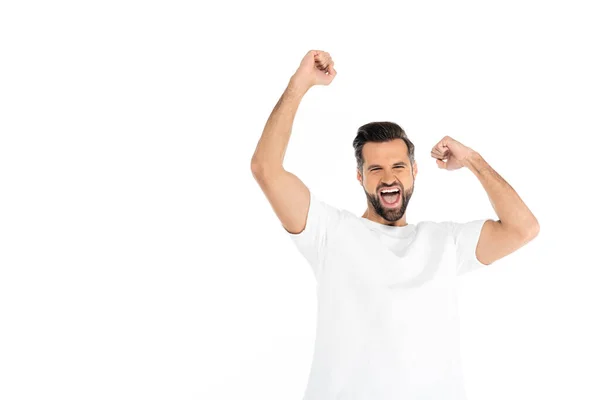 Excited man screaming while showing triumph gesture isolated on white - foto de stock
