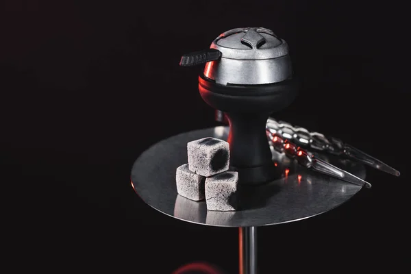 Coals on hookah with lighting isolated on black — Stock Photo