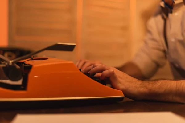 Cropped view of writer using typewriter machine — Stock Photo