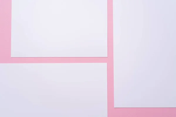 Top view of blank empty papers on pink - foto de stock