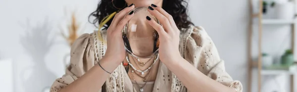 Cropped view of medium holding orb at home, banner — Stock Photo