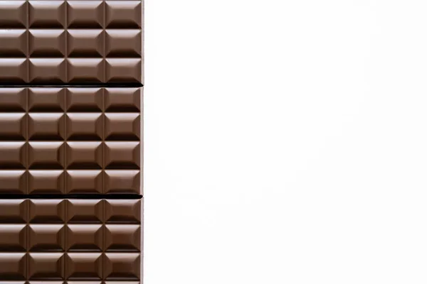 Top view of chocolate bars isolated on white with copy space — Stock Photo