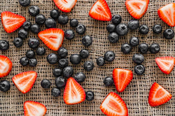 Top view of fresh berries on sackcloth — Stock Photo