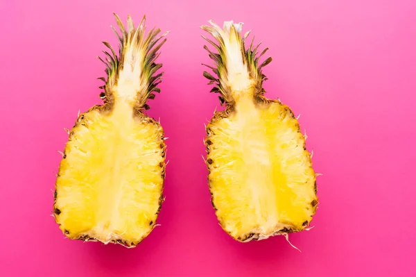 Top view of ripe pineapple on pink surface — Stock Photo