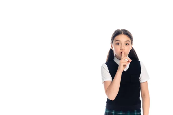 Schoolkid mostrando gesto segreto isolato su bianco — Foto stock