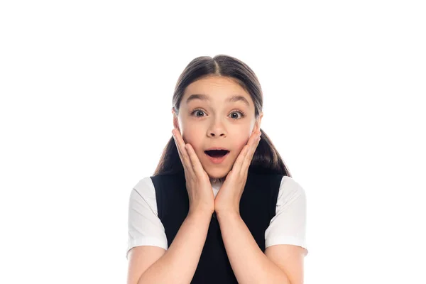 Excited schoolchild looking at camera isolated on white — Stock Photo