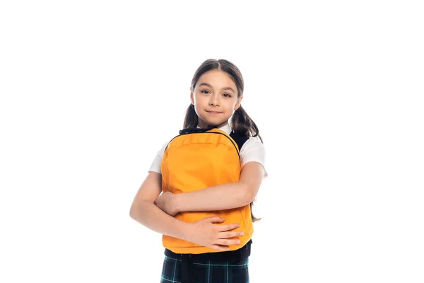 Preteen schoolkid holding backpack isolated on white — Stock Photo