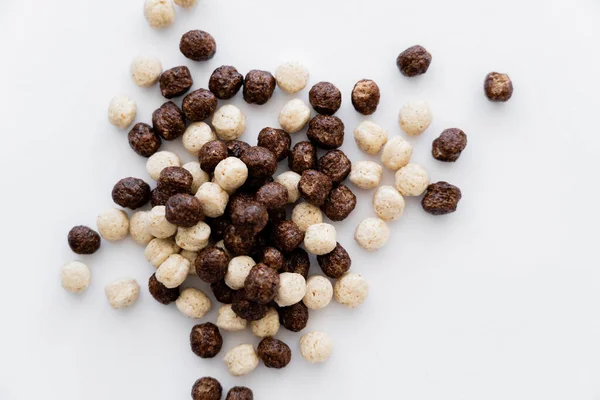 Top view of cereal balls with chocolate and vanilla flavors isolated on white — Stock Photo