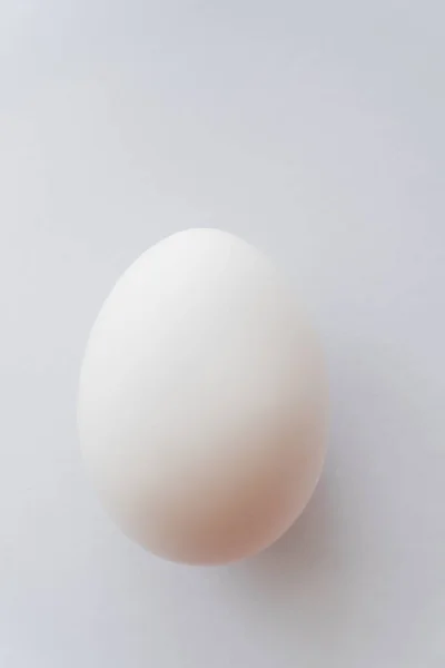 Close up view of organic chicken egg on white background — Stock Photo