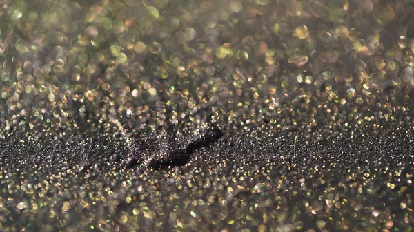 Visão de perto da sombra de olho cinza com brilho borrado — Fotografia de Stock