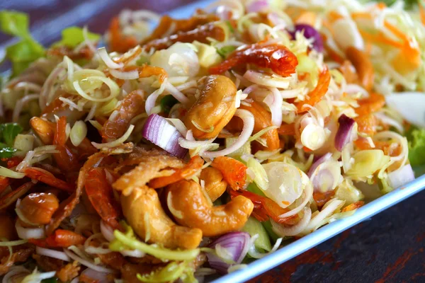 Herb salad with deep fried fish and lemongrass. Thai food. — Stock Photo, Image