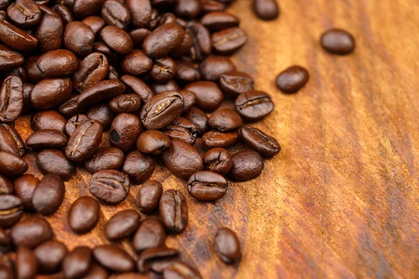 Coffee bean on wood background — Stock Photo, Image