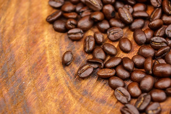 Kaffeebohne auf Holz Hintergrund — Stockfoto