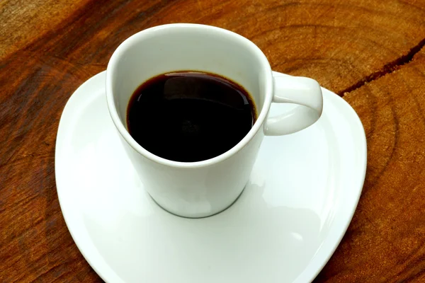 Černá káva na dřevo pozadí. — Stock fotografie