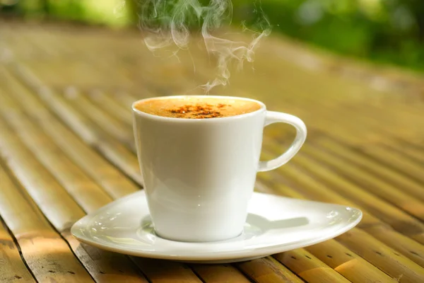 Morning coffee on bamboo — Stock Photo, Image