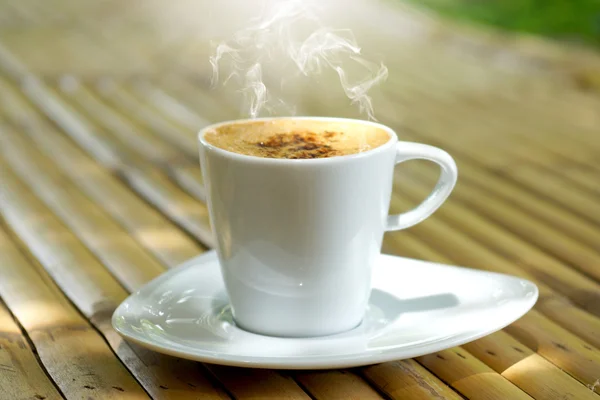 Morning coffee on bamboo — Stock Photo, Image