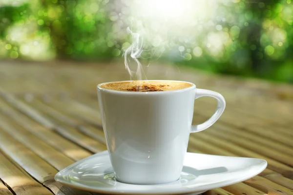 Morning coffee on bamboo — Stock Photo, Image