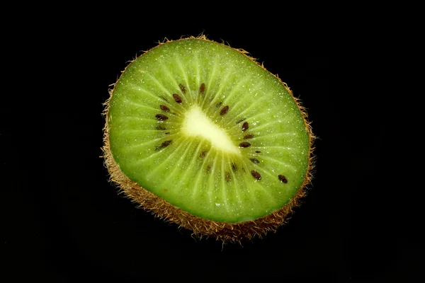 Kiwi fruit isolated on black background — Stock Photo, Image