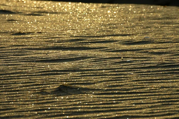 Riflesso di sabbia del tramonto sulla spiaggia . — Foto Stock