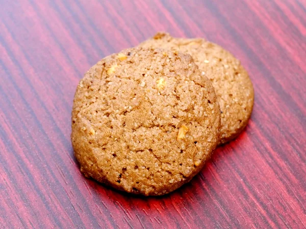 Cookies på trä bakgrund. — Stockfoto