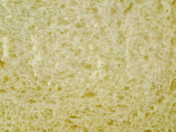 Gesneden brood honing geïsoleerd op de witte achtergrond — Stockfoto