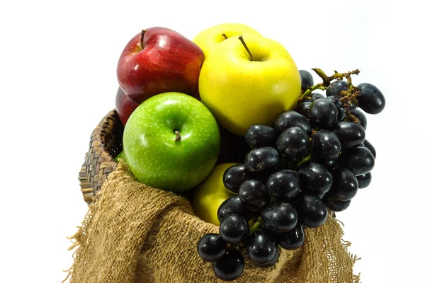 Apple multicolored and black grape. — Stock Photo, Image