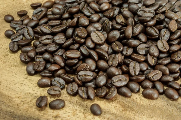 Coffee bean on wood background — Stock Photo, Image