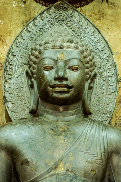 Asian religious art. Ancient green stone sculpture of Buddha at — Stock Photo, Image