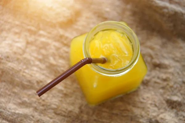 Orange juice in glass squares in the morning. — Stock Photo, Image