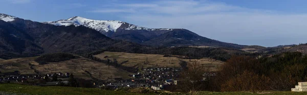 Scenic landscape with mountains and sky at background, banner 