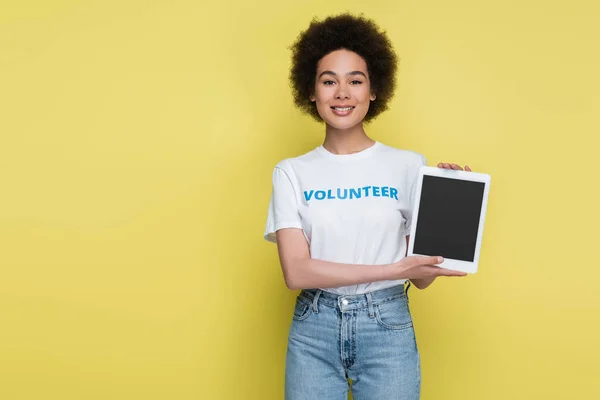 Pretty African American Volunteer Showing Digital Tablet Blank Screen Isolated — Stock Photo, Image