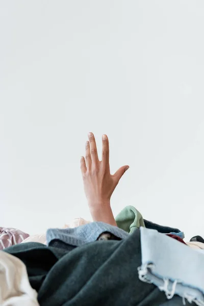 Cropped View Hand African American Woman Pile Garments Grey Background — Stok fotoğraf