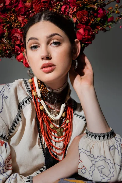Portrait Pretty Ukrainian Woman Traditional Clothes Adjusting Floral Red Wreath — Stock Photo, Image