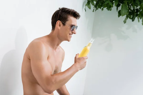 Cheerful Shirtless Man Sunglasses Looking Bottle Beer Outdoors — Stock Fotó