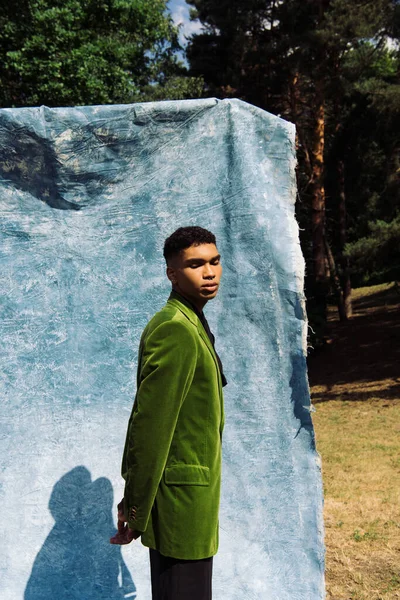 African American Man Green Blazer Posing Closed Eyes Hands Back — Fotografia de Stock