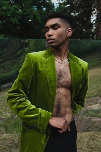 Fashionable African American Man Beads Velvet Blazer Posing Forest Flexible — Stockfoto