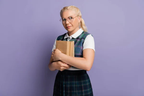 Blonde Student Eyeglasses Holding Books Isolated Purple —  Fotos de Stock