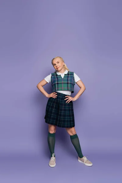 Full Length Pretty Blonde Student Uniform Looking Camera Purple Background — Foto de Stock