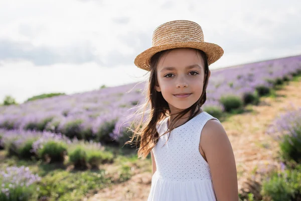 Smiling Girl Sun Hat White Dress Looking Camera Blurred Lavender — Stock Photo, Image