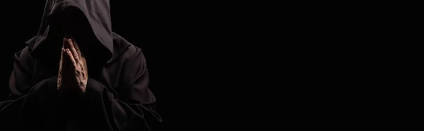 Священик Обличчям Затьмарений Темним Капюшоном Молиться Ізольовано Чорному Банер — стокове фото