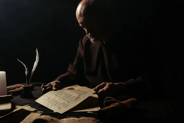 Senior Monk Looking Manuscript Wax Seal Isolated Black — Stock Photo, Image