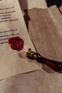 top view of medieval manuscript with wax seal on parchment sheets clipart