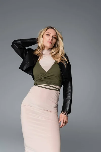 Blonde Model Black Leather Jacket Beige Dress Posing Isolated Grey — Stockfoto