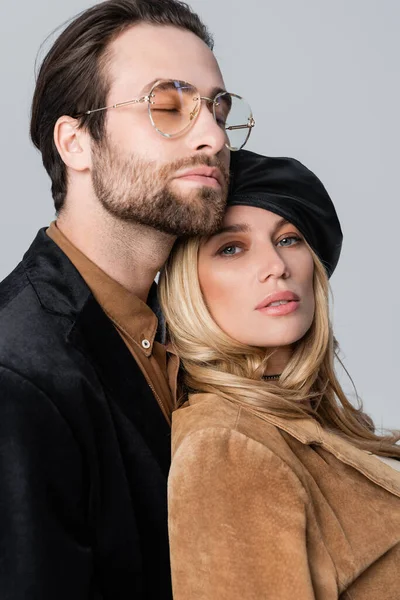 Portrait Stylish Couple Beret Sunglasses Posing Isolated Grey — Stockfoto