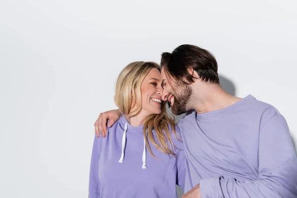 Happy Bearded Man Purple Sweatshirts Smiling Blonde Woman Grey — Stock fotografie