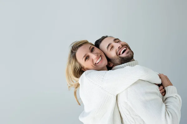 Positive Blonde Woman White Knitted Sweater Hugging Bearded Man Isolated — Stok fotoğraf