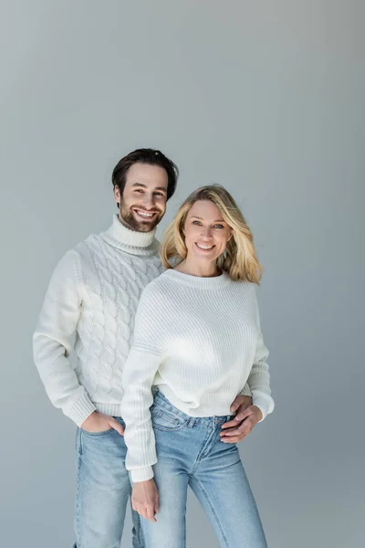 Cheerful Man Standing Hand Pocket Hugging Blonde Girlfriend Sweater Isolated — 스톡 사진