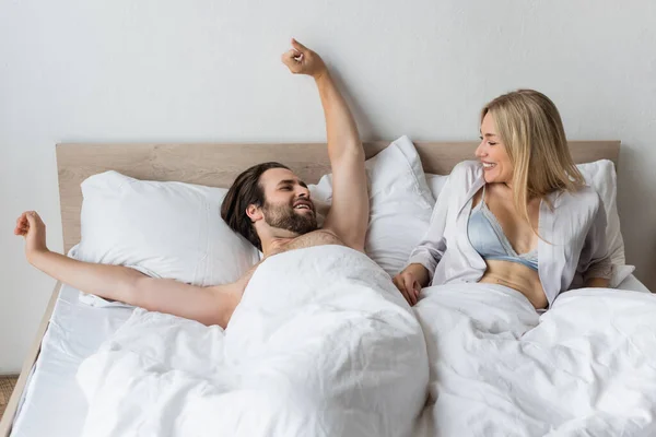 Brunette Man Stretching Bed Sexy Happy Woman — Fotografia de Stock
